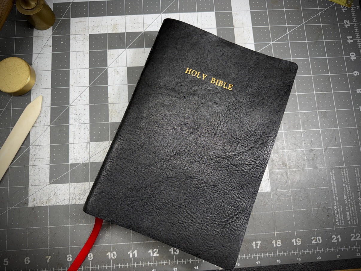 Finished black leather Bible with gold Holy Bible lettering