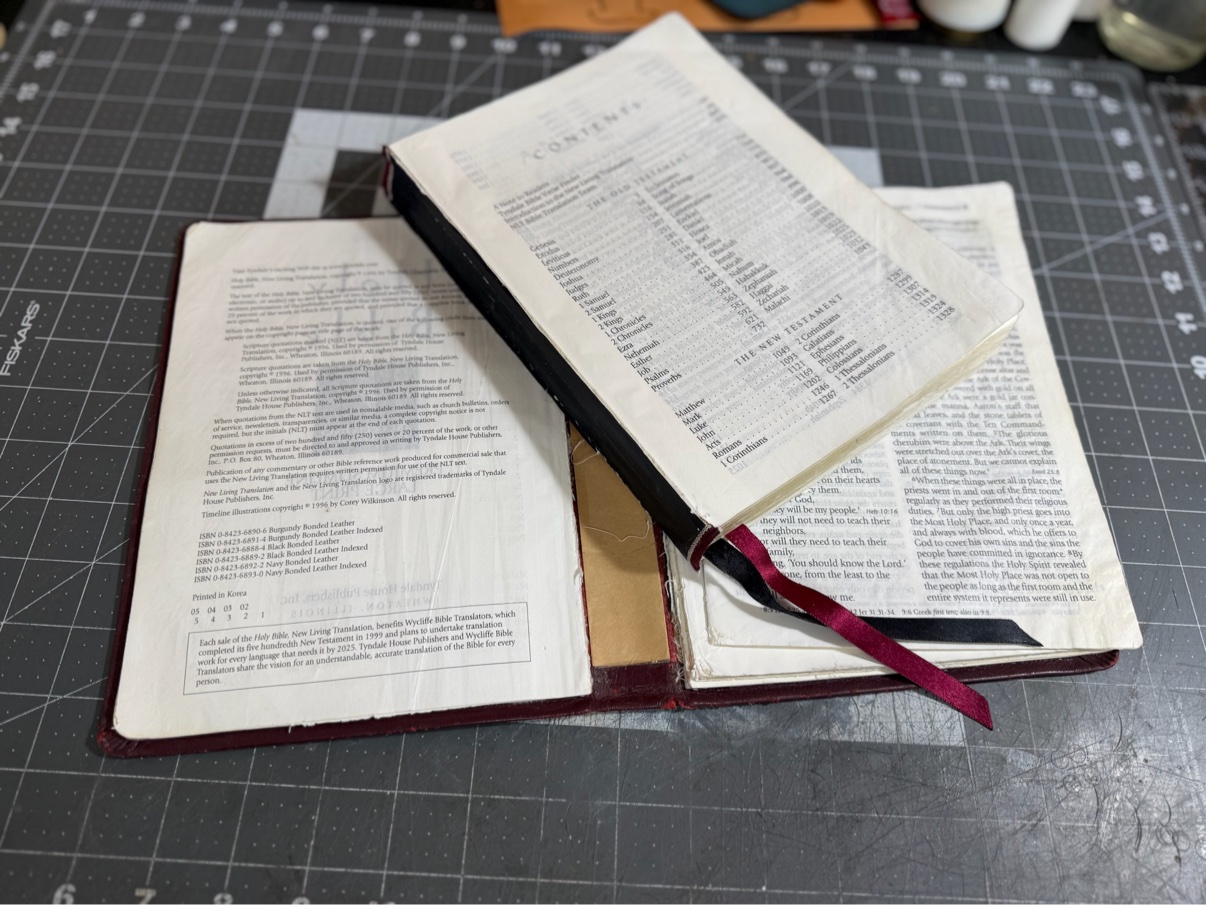 Bible taken apart for repair work